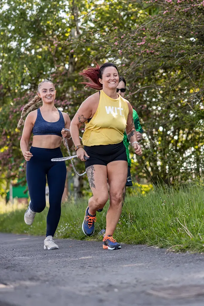 athletes running as part of a team workout